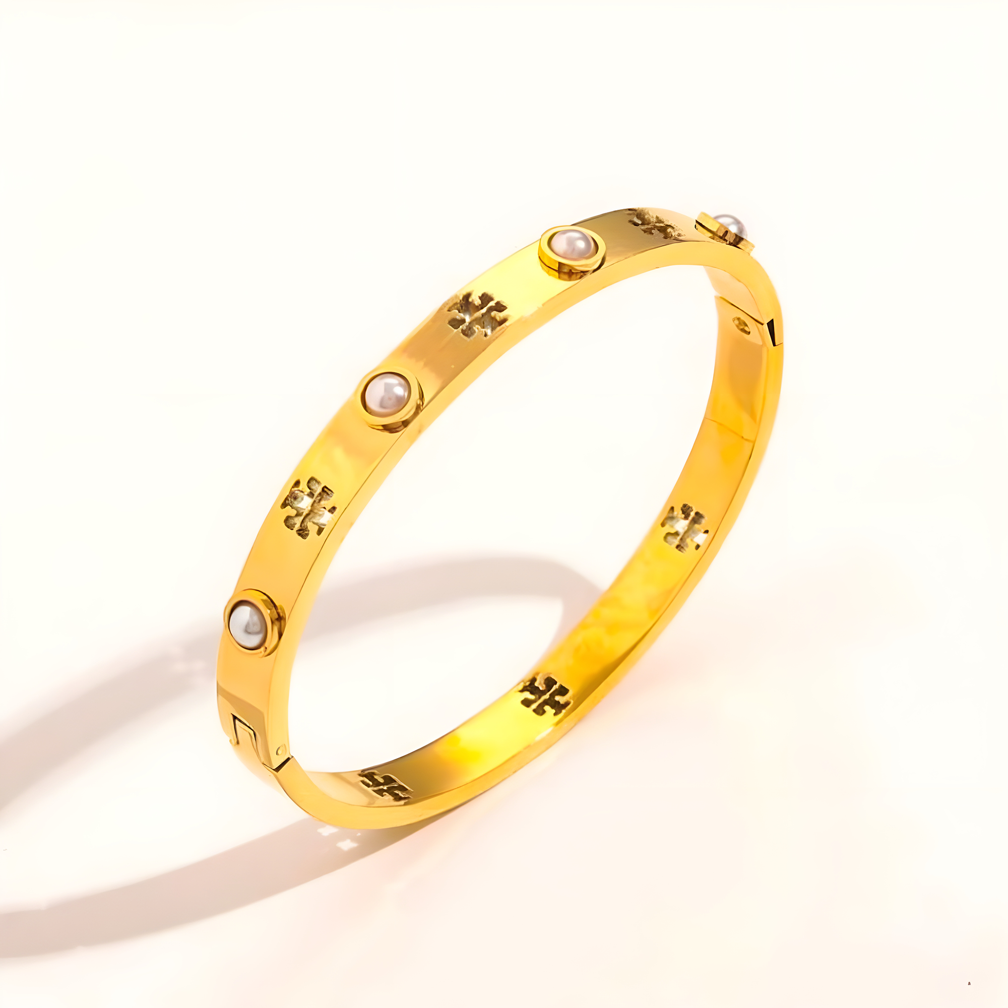 Tory Burch Gold Pearl Emblem Bangle (Stainless Steel)