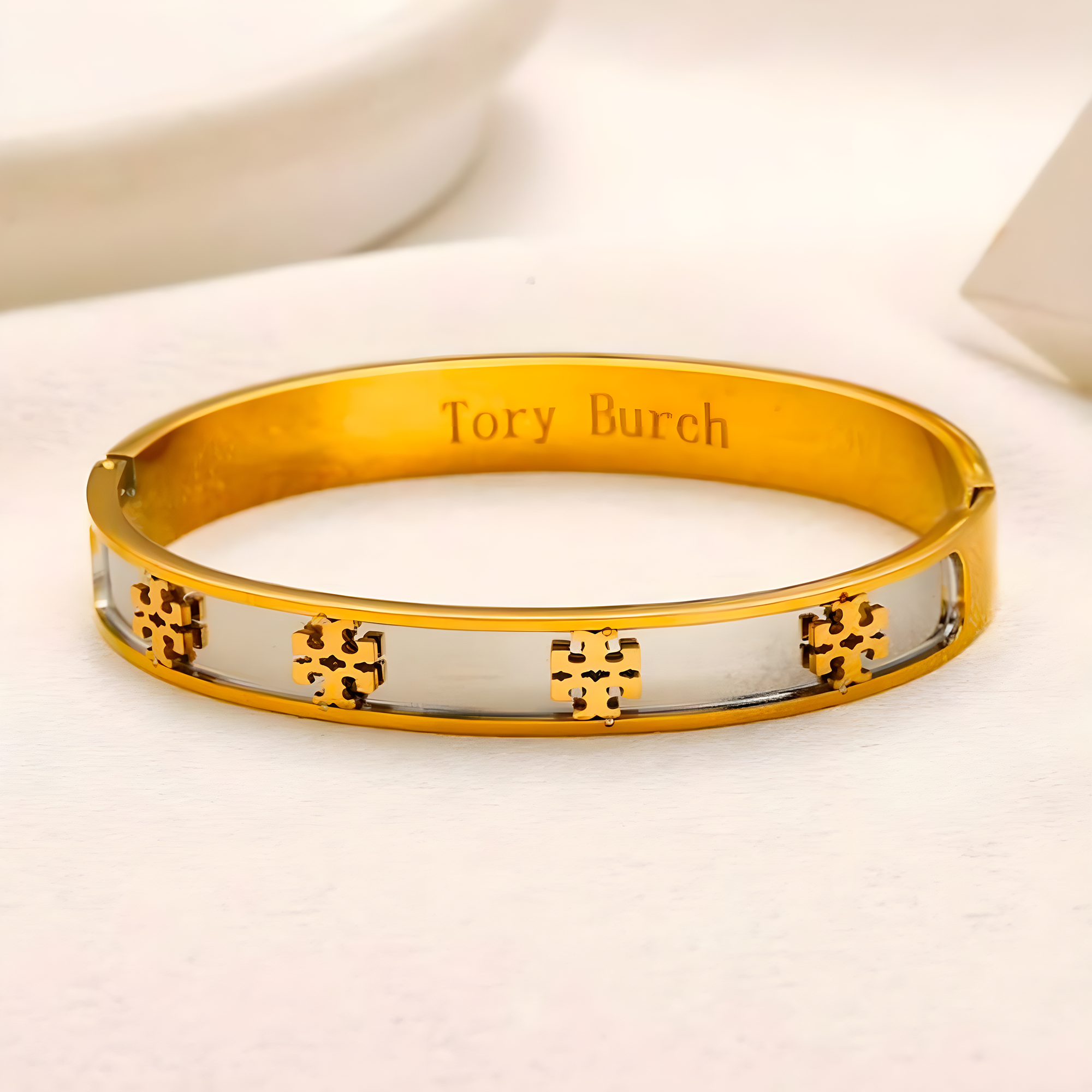 Tory Burch Two-Tone Emblem Bangle (Stainless Steel)