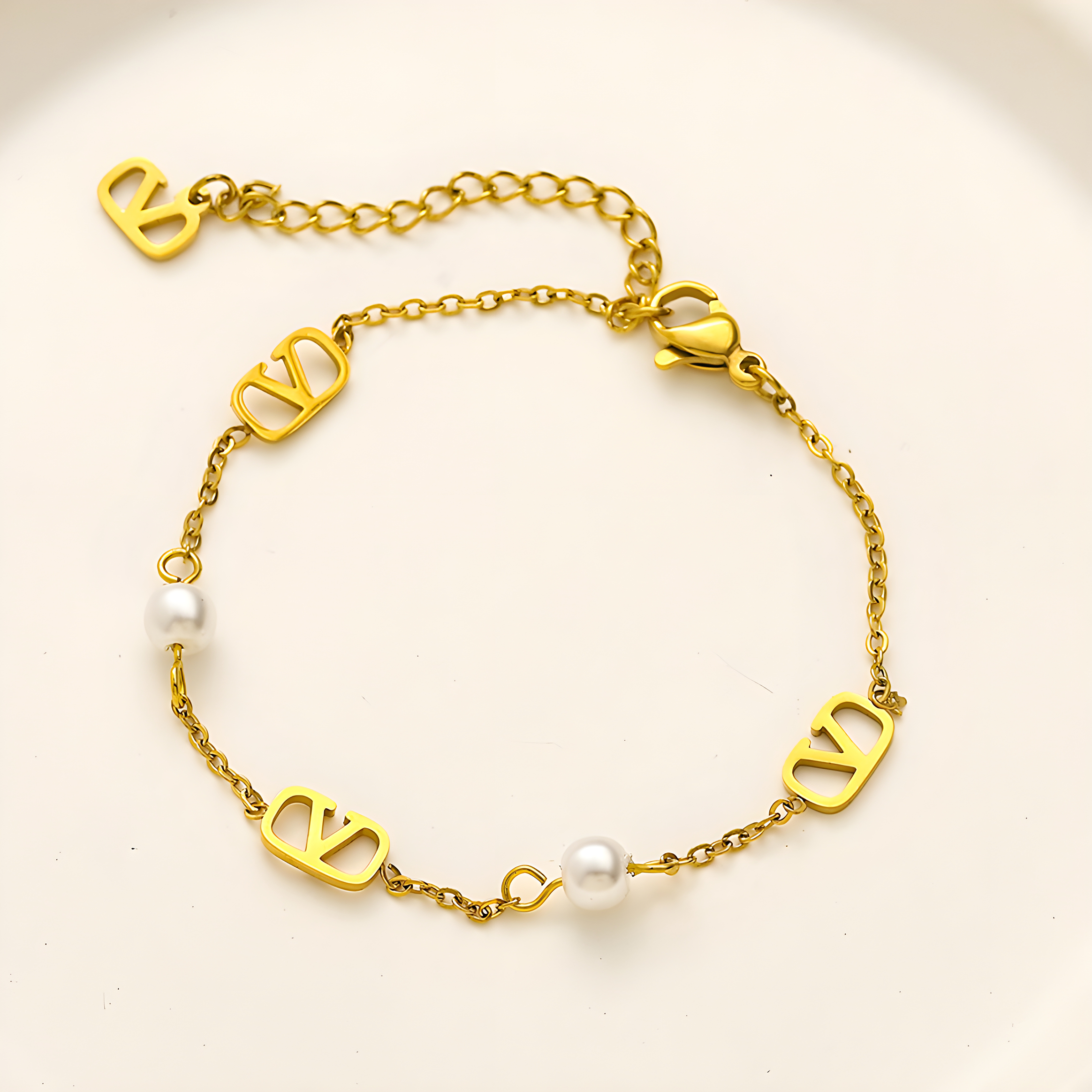 Valentino Dainty Gold Pearl Emblem Bracelet (Stainless Steel)